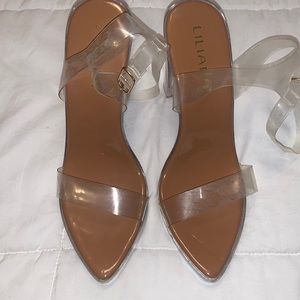 Clear strapped 5 inch heels.